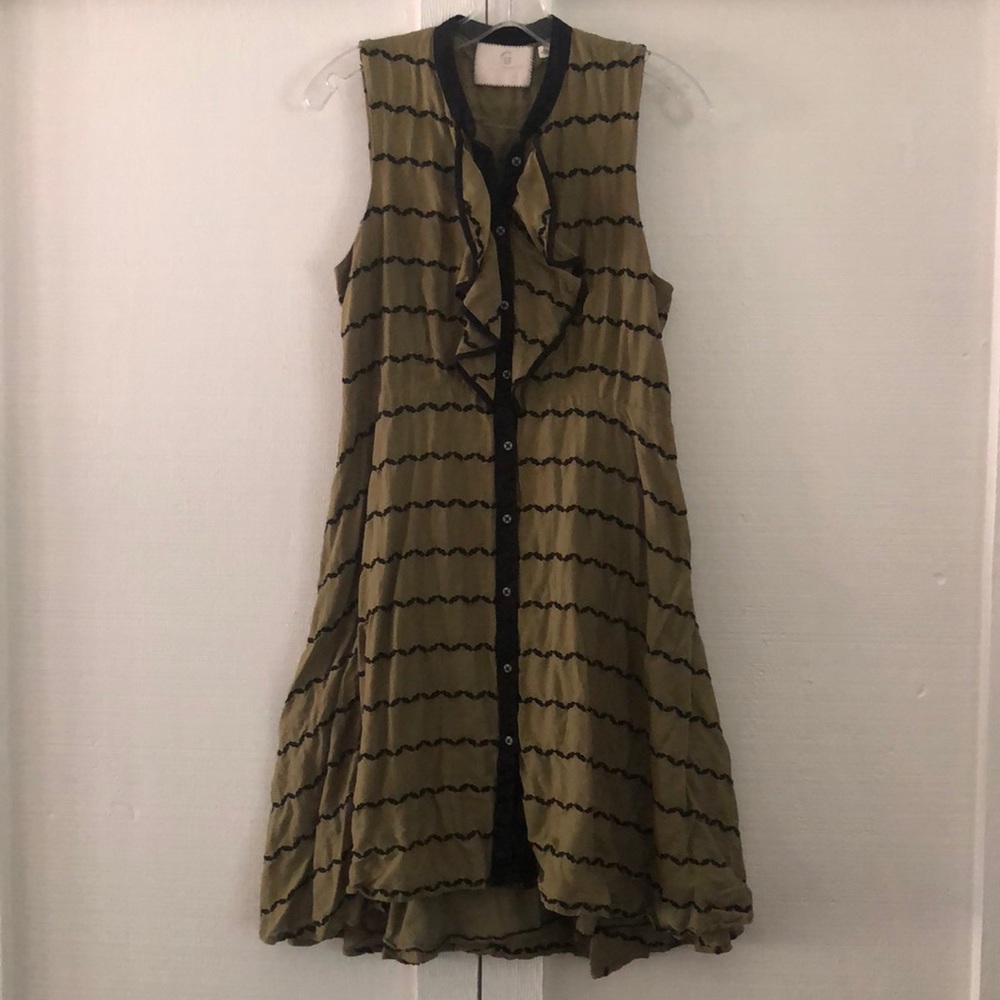 Green & black sleeveless dress.